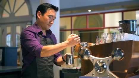 barista preparing coffee in cafe 4k