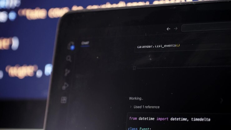 Software Developer Writing Python Code in Integrated Development Environment