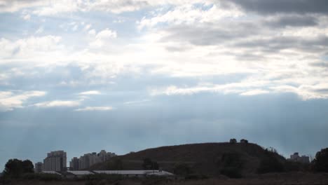 dramatic clouds above the hill time-lapse