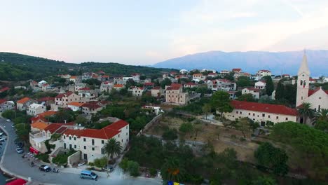 bay town of selca island brac croatia europe in an aerial drone shot