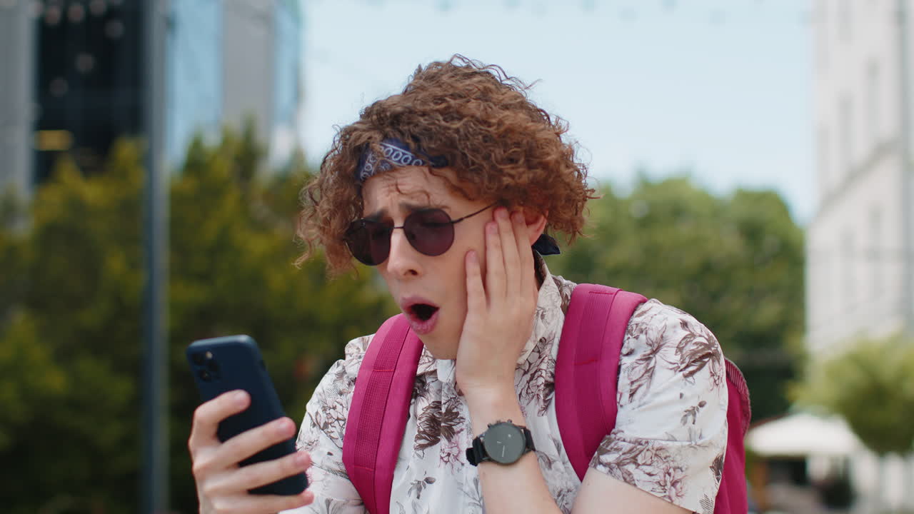 Man using smartphone loses becoming shocked sudden casino app lottery results bad news loss fail