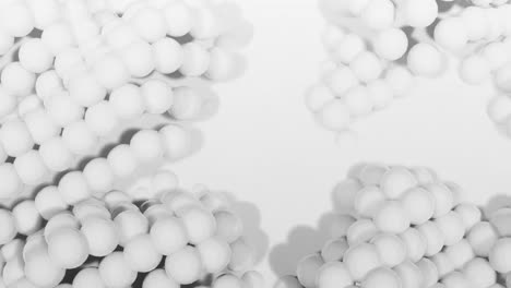 3D-spheres-moving-against-white-background