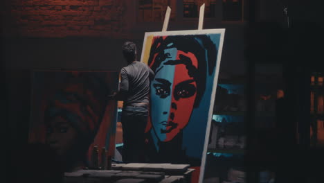 artist painting in studio