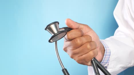 doctor holding stethoscope