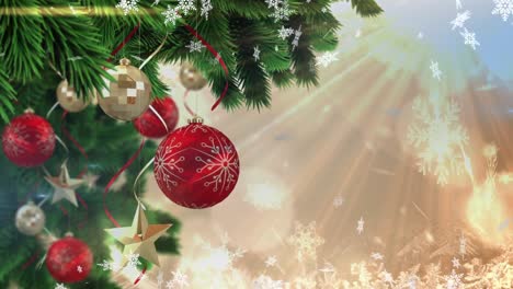 Animation-of-christmas-boubles-and-snow-falling-over-glowing-light