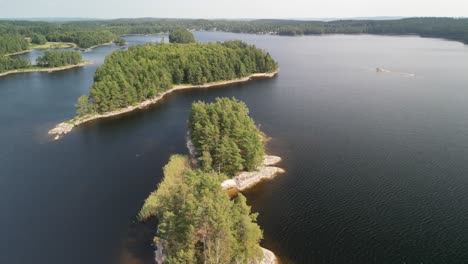 Aerial-of-Swedish-Lake-with-islands,-Hällingsjö,-Sweden