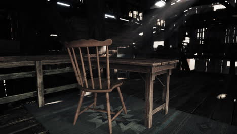 rustic wooden chair and table in an old barn