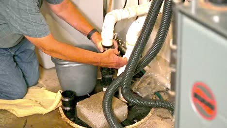 slow-motion septic sewer sump pump repair with a repairman