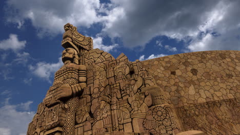 Closeup-time-lapse-of-the-front-of-the-monument-to-the-homeland-with-blue-sky-on-the-Paseo-de-Montejo-in-Merida,-Yucatan,-Mexico