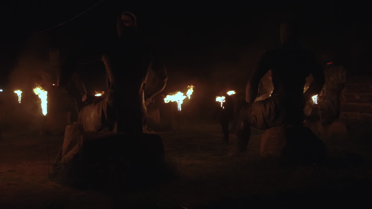 Shot of evil sorceress preparing for making rituals at night, using black witchcraft