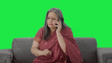 Angry-Indian-old-woman-shouting-on-call-Green-screen