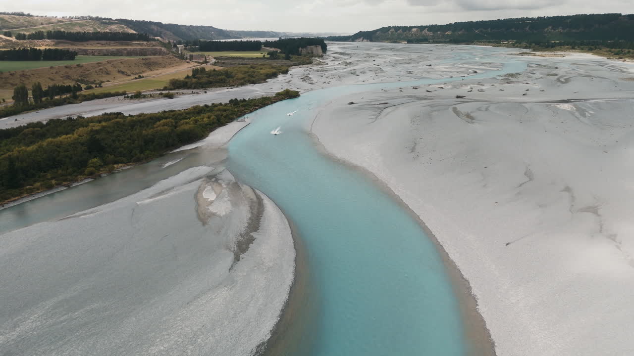 Aerial View of a Turquoise River in New Zealand