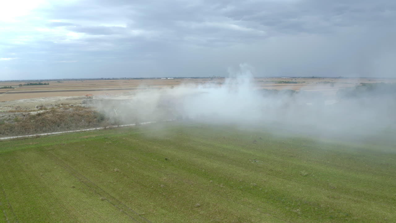 Construction site with dust and smoke