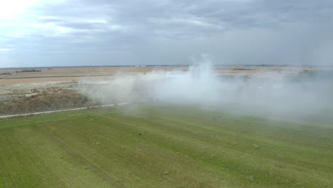 construction site with dust and smoke