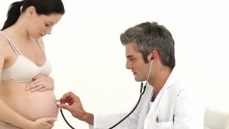 gynecologist examining a pregnant woman