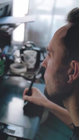 man working on a digital drawing tablet