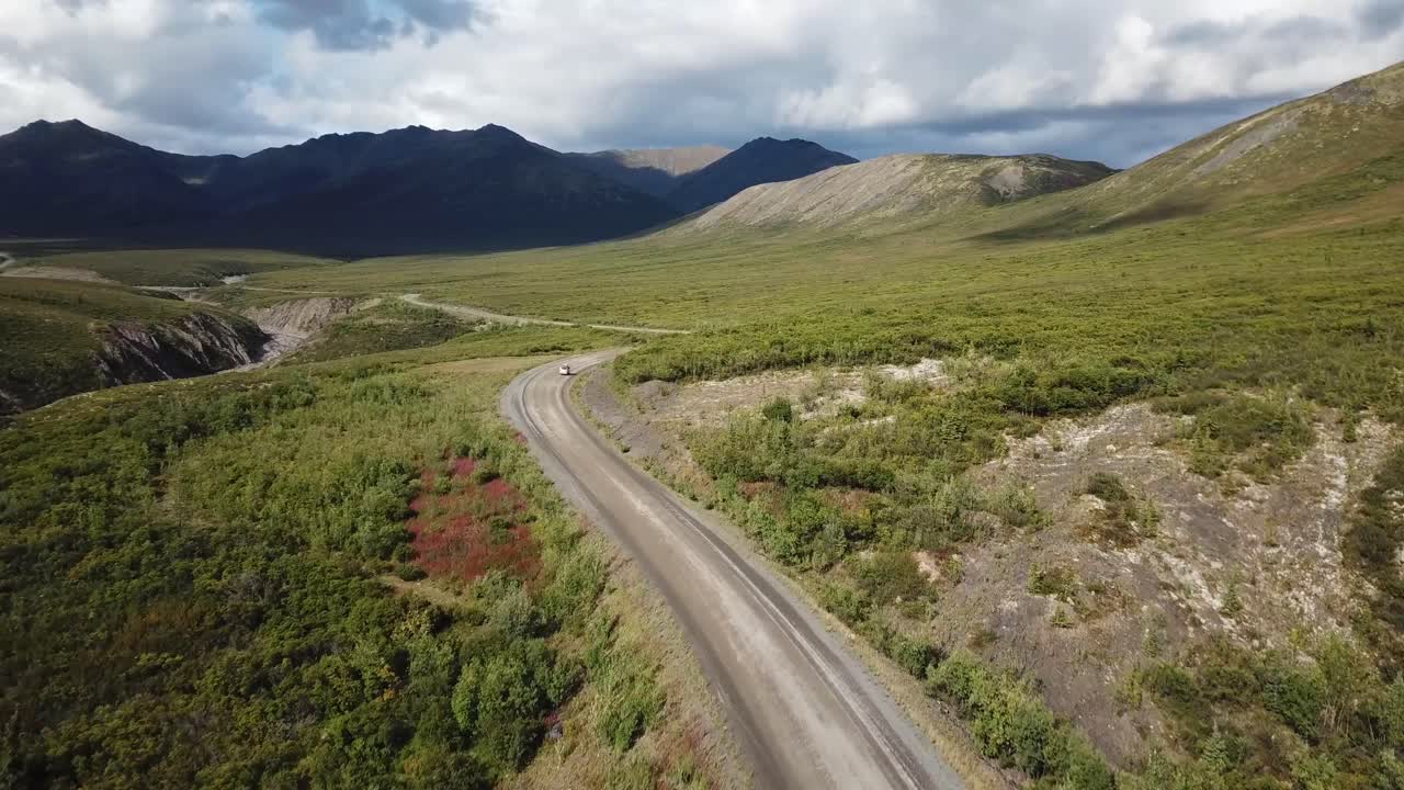 Van driving near the Arctic Circle in Northern Yukon