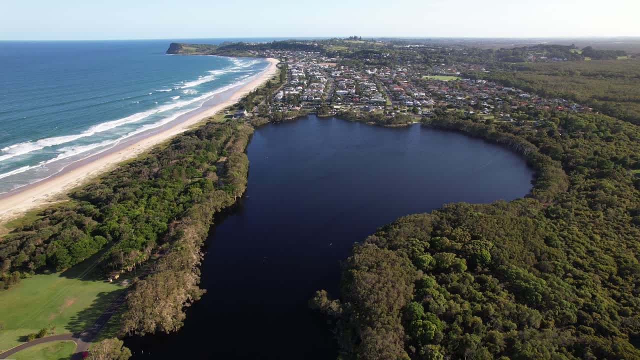 Lake Ainsworth With Lennox Head Beach In Lennox Head, NSW, Australia - Drone Shot