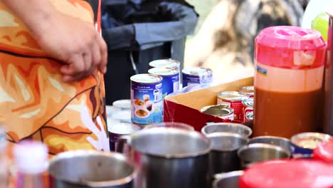 making thai tea with various ingredients and tools