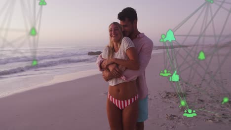 animación de una red de conexiones con iconos sobre una pareja enamorada en la playa