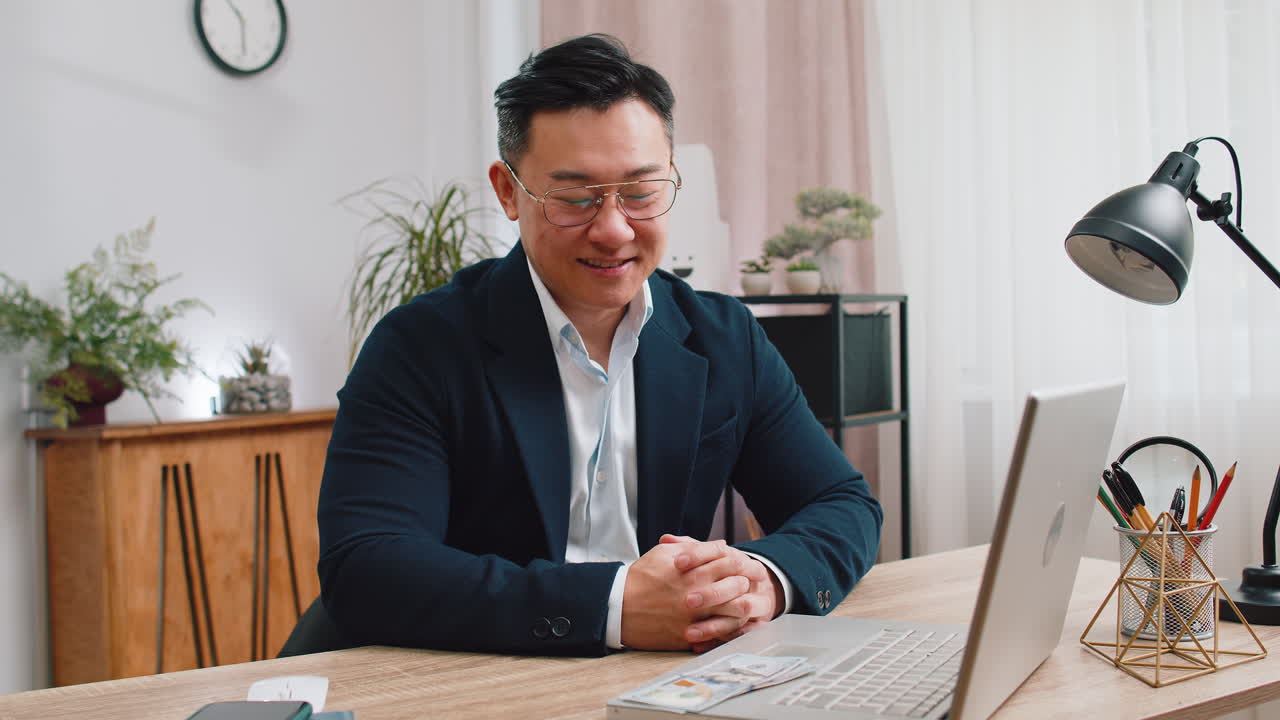 Rich businessman in suit working on laptop pc counting money cash calculate earnings income profit