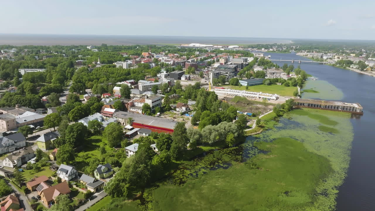Aerial view rising in front of downtown Parnu, sunny, summer day in Estonia