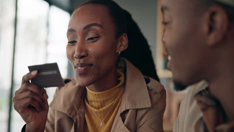 restaurant, tablet or black couple with credit