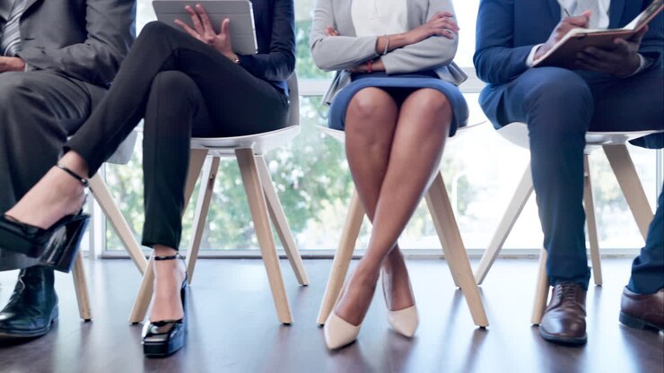 Business people, legs and group in a row in office