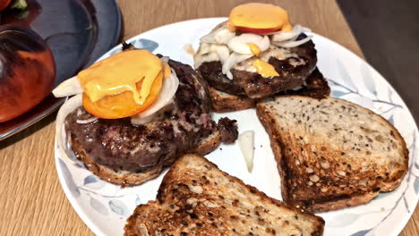 delicious cutlet sandwich with cheese and vegetables, close up