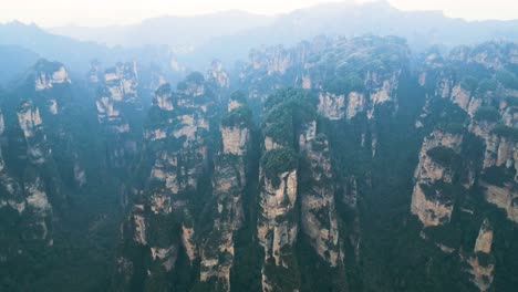 aerial view captures zhangjiajie national park in wulingyuan, hunan, china, featuring the renowned karst mountains, famously known as the avatar hallelujah mountains