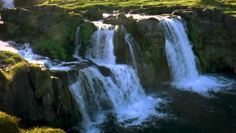 Slow-motion-footage-of-Kirkjufellsfoss-near-Kirkjufell-mountain-on-Snaefellsnes-peninsula,-Iceland