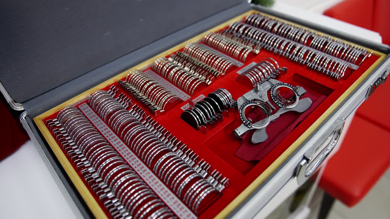 Set of trial lenses for phoropter. Trial frame phoropter on plate with choose lenses from set of corrective lens