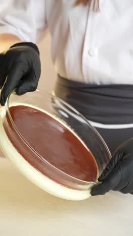 pastry chef preparing a creamy cake base