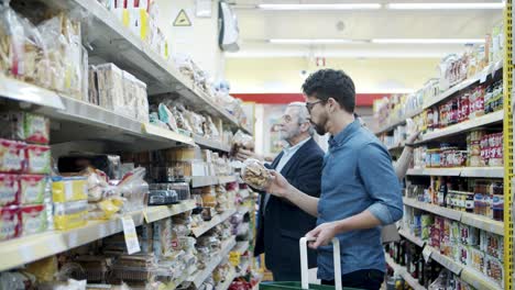 people choosing products in supermarket