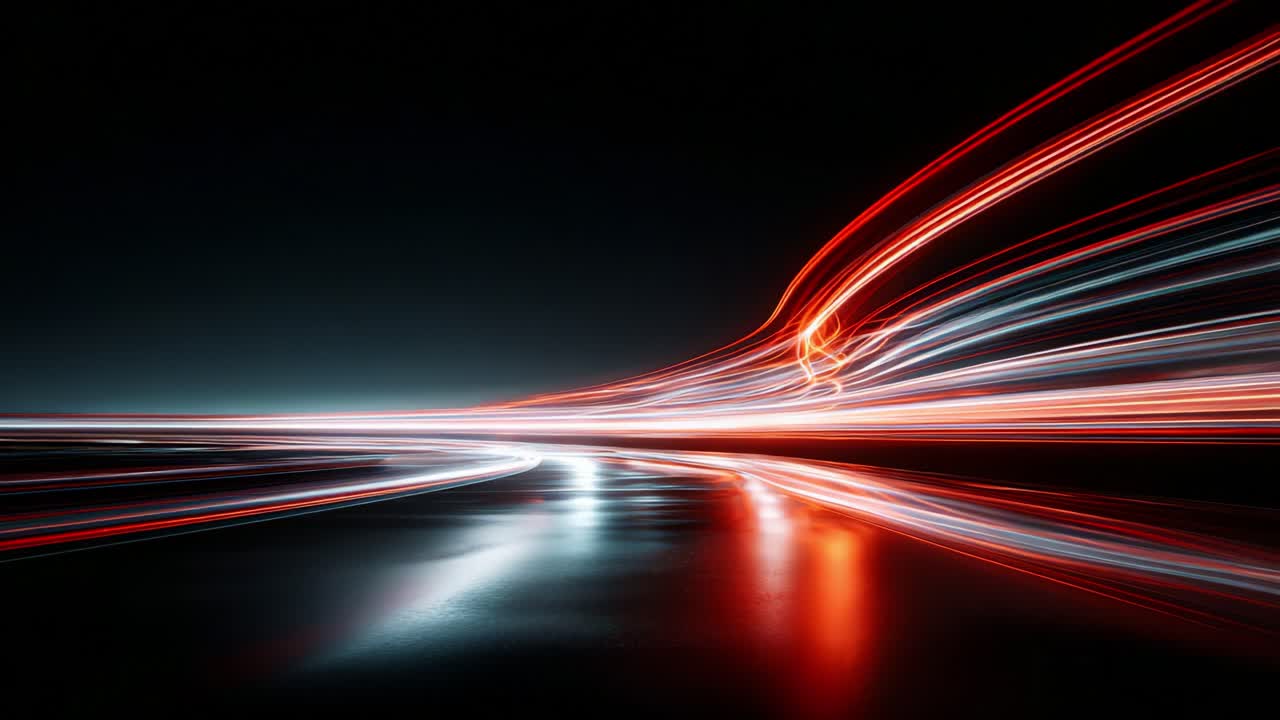 Dynamic Flow of Light Trails Captured in a Stunning Night Scene, Showcasing Vibrant Colors and Reflections on a Dark Surface, Signifying Motion and Energy