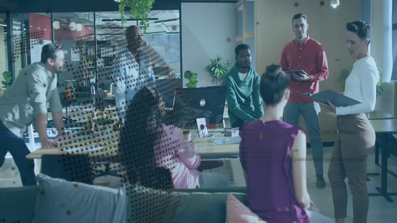 Presenter tapping tablet and leading ideation, animated charts appearing around team in business