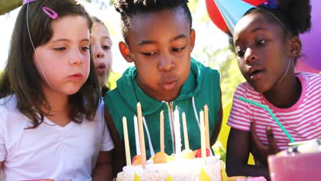 boy celebrating her birthday with his friends