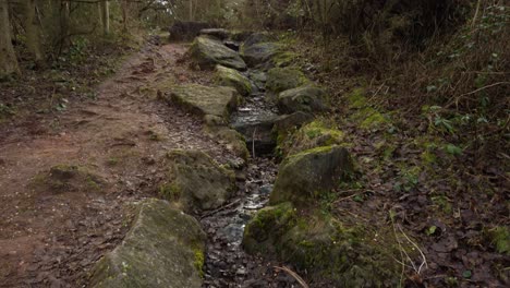 Looking-up-a-dried-rocky-waterfall-during-Winter