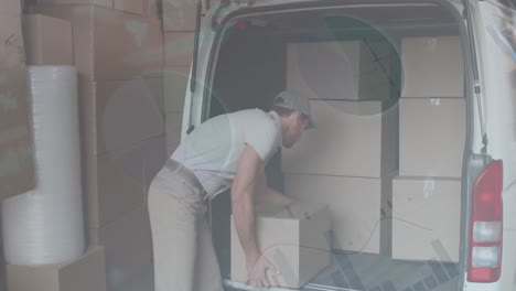 statistical data processing against caucasian delivery man stacking boxes in his delivery van