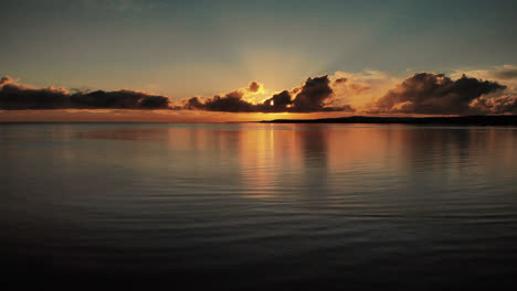 drone flying up the sky as the sun rises