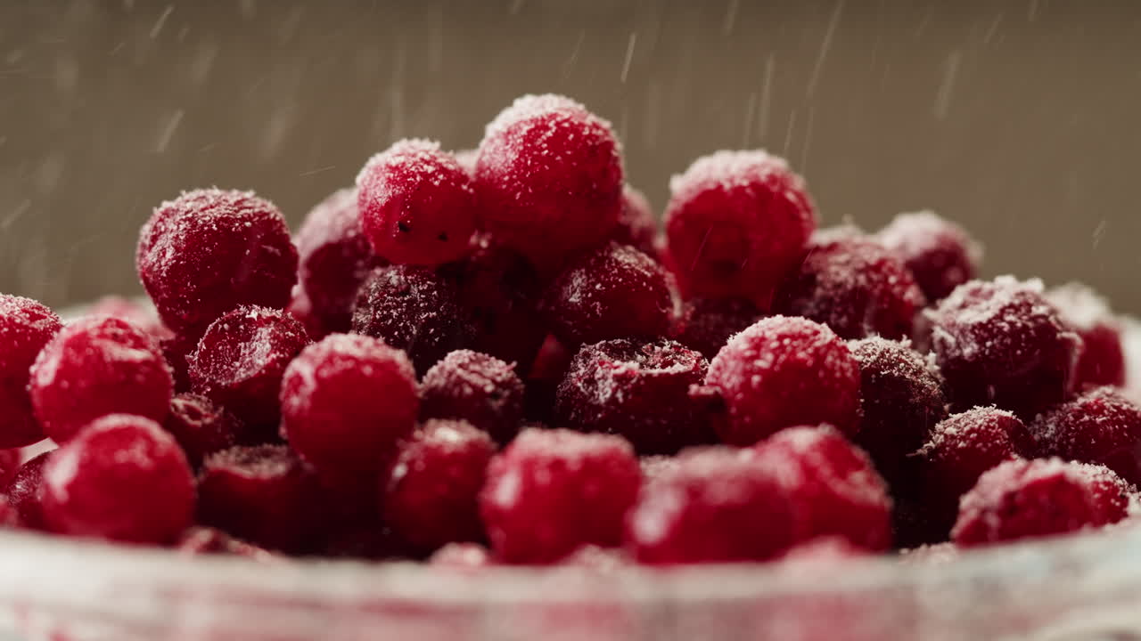 Frozen cranberries cooking for tea or jam, Background Close up of cranberry berries in on the kitchen, chef making dessert healthy pie.