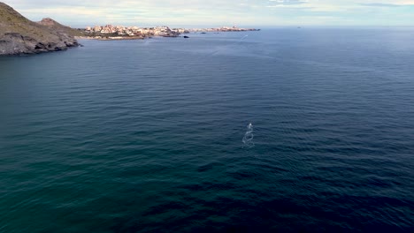 jet ski sailing at seascape in the south coast of spain aerial drone view