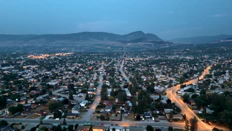explore kelowna's infrastructure expansion and future economic trends through stunning 4k aerial footage, showcasing urban development and growth potential.