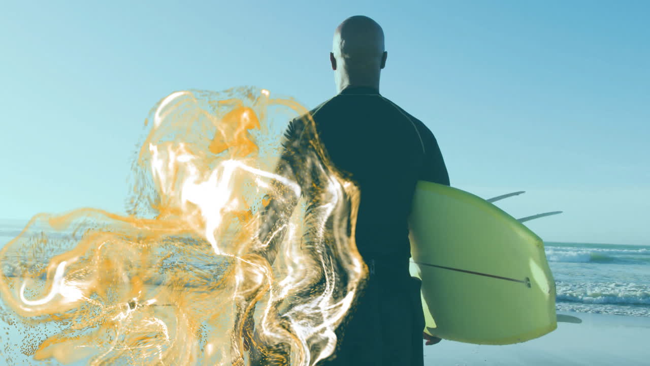 man holding surfboard standing shore, with swirling golden shapes blending ocean for graphic design