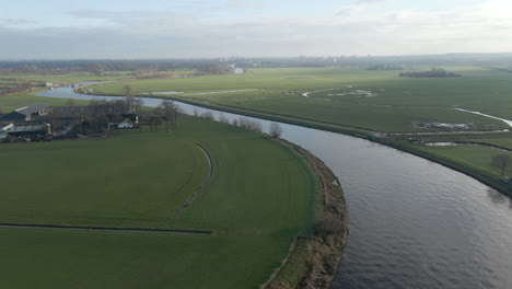 aerial of beautiful dutch landscape in the rural netherlands with a river