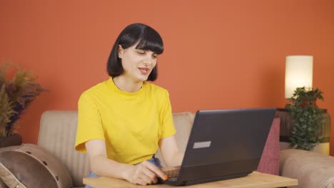 woman making video call on laptop.