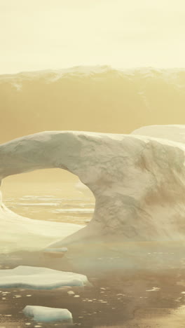 stunning view of a large iceberg arching over the ocean