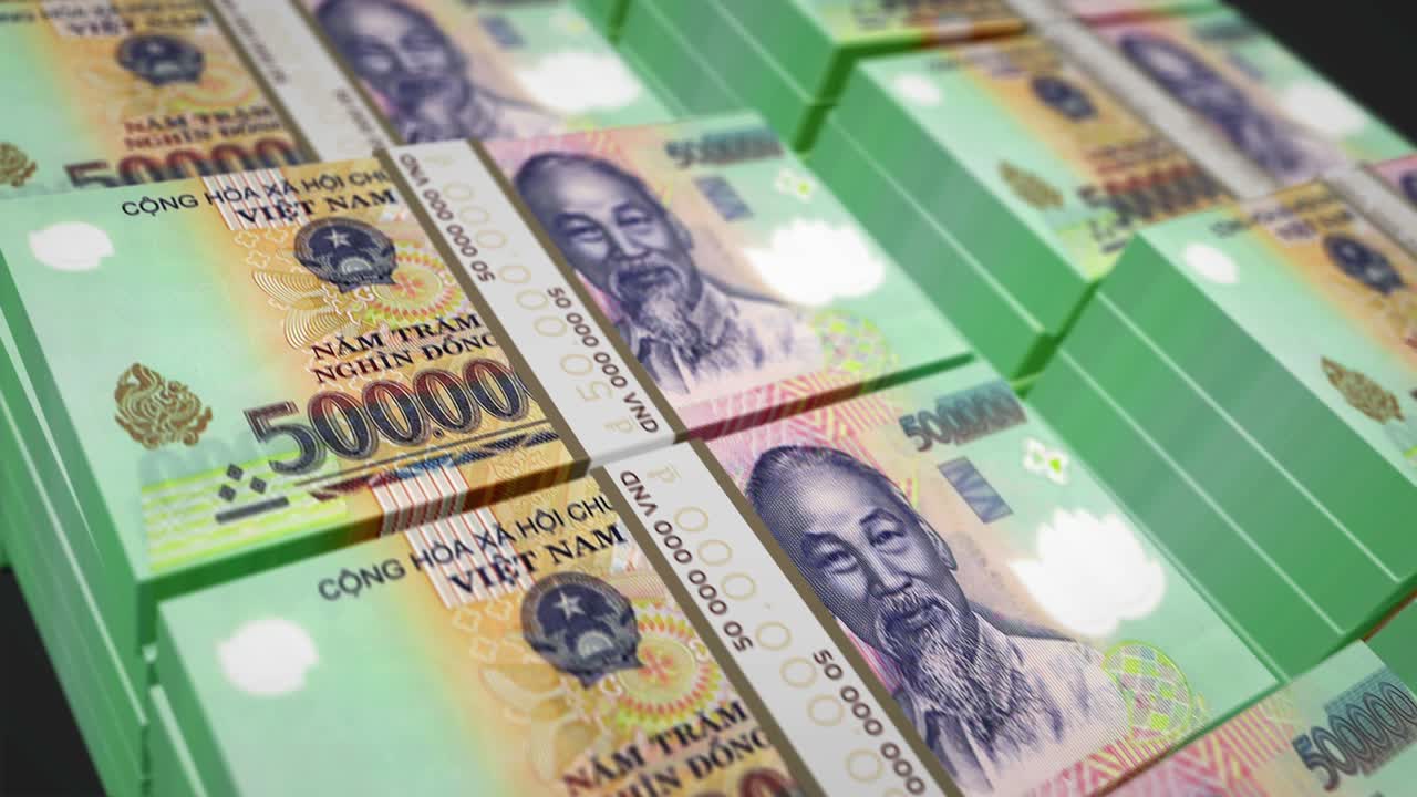 베트남 돈 지폐는 완벽한 루프로 포장되어 있습니다.