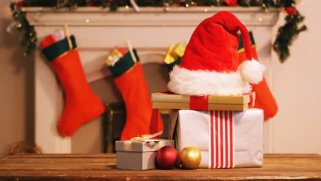 wrapped gifts on wooden table