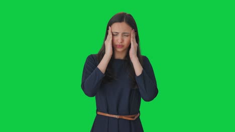 sick indian girl having headache green screen
